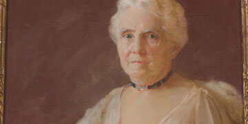 Painted portrait of Hazle Buck Ewing, 56, wearing her riding outfit.