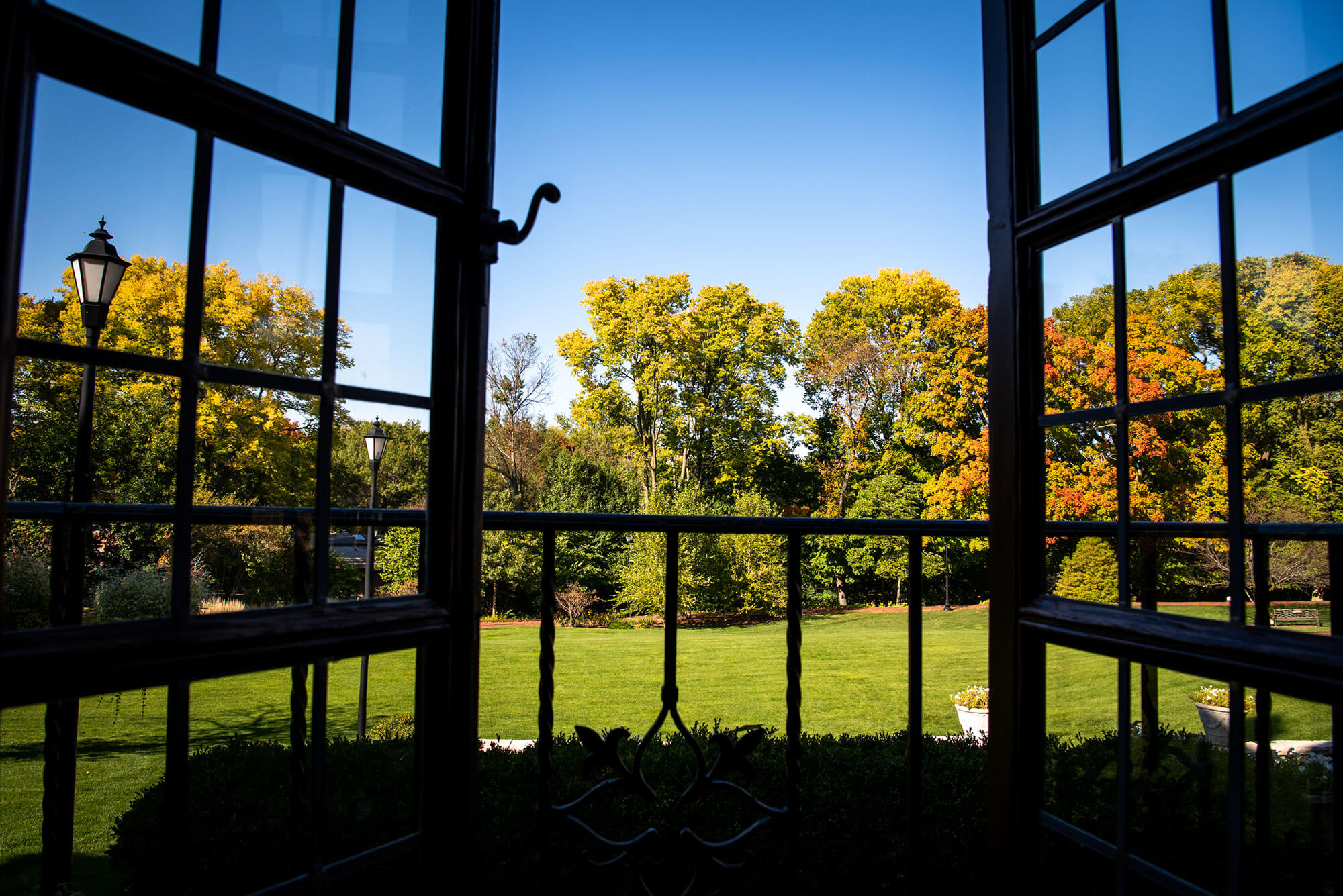 The fall  view of a open windown on the Ewing Manor.
