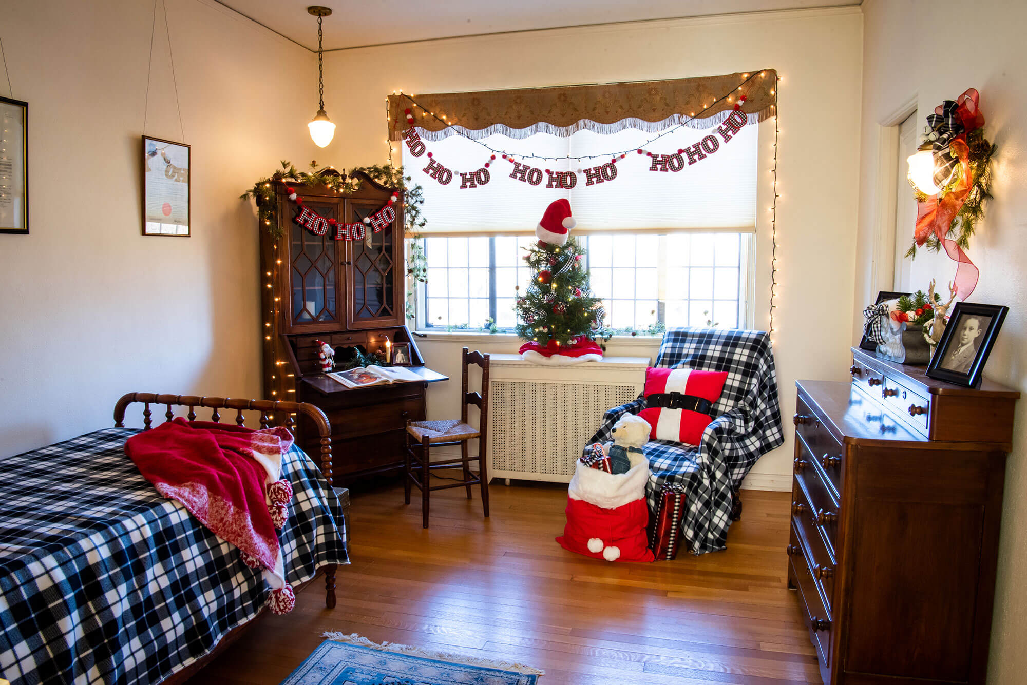 One of the bedrooms decorated with Christmas ornaments.