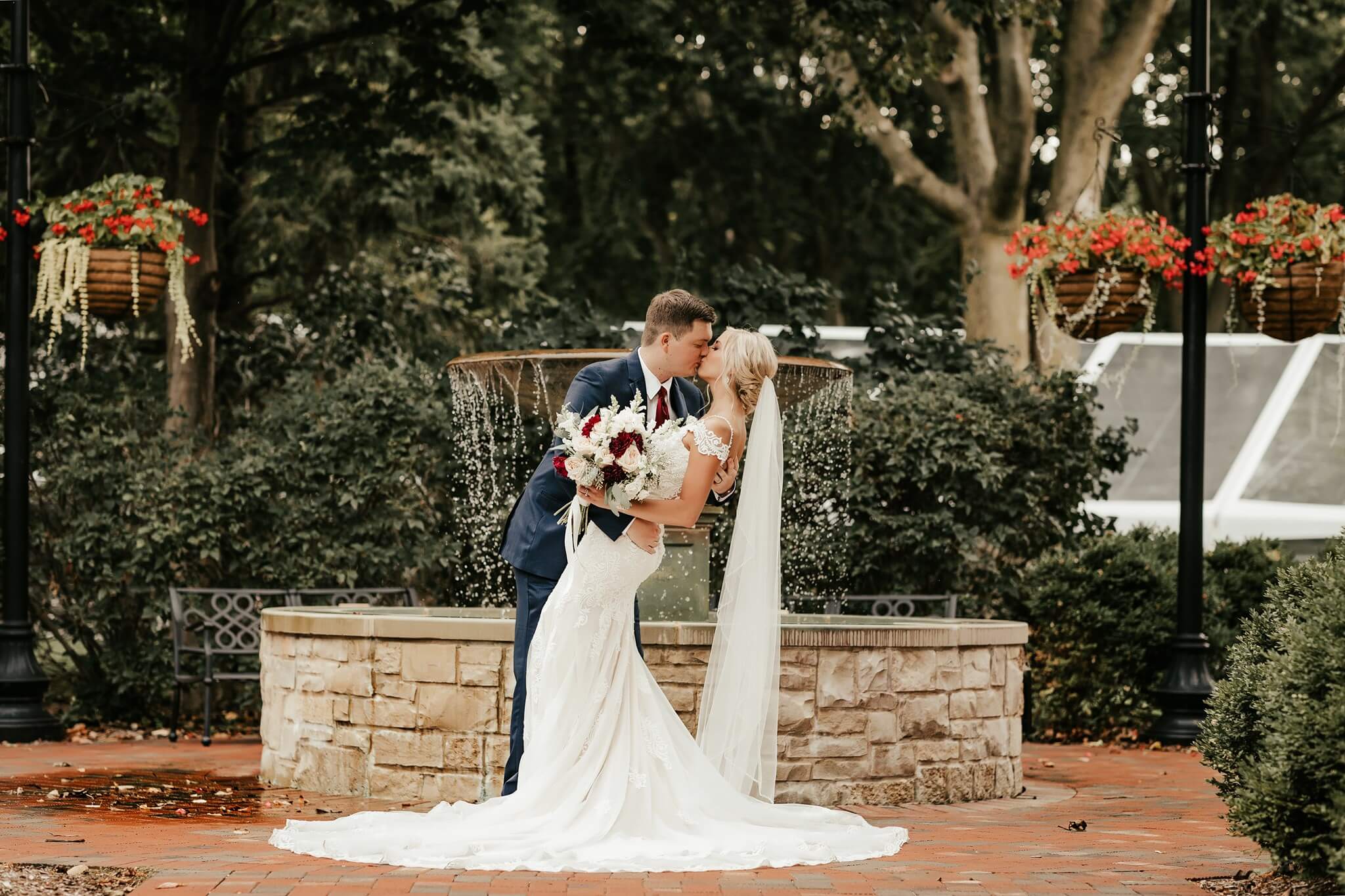 Bride and groom kissing.