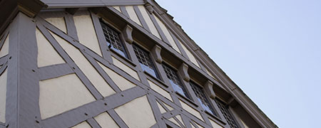 Wooden and Concrete beams on the outside of the manor.