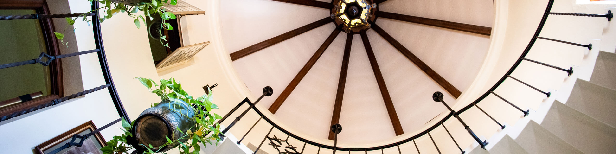 Photo taken from the bottom of the spiral staircase towards the ceiling.