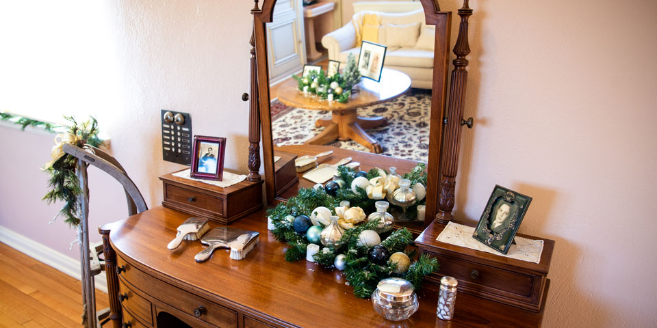 A wooden vanity decorated for the holidays.